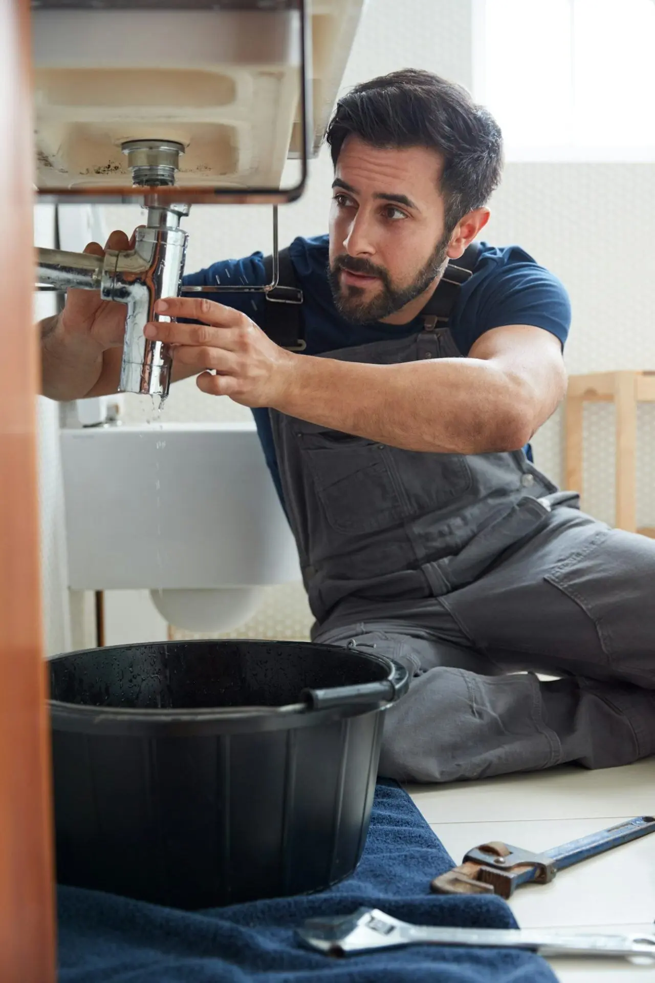 Emergency bathroom sink repair by PAGE Tradie's licensed Sunshine Coast plumber