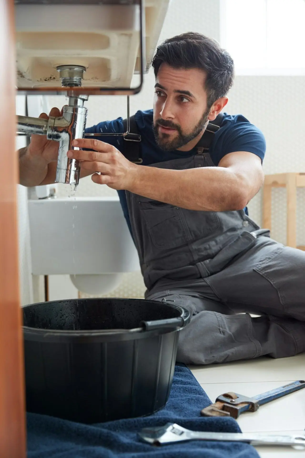 Emergency bathroom sink repair by PAGE Tradie's licensed Sunshine Coast plumber